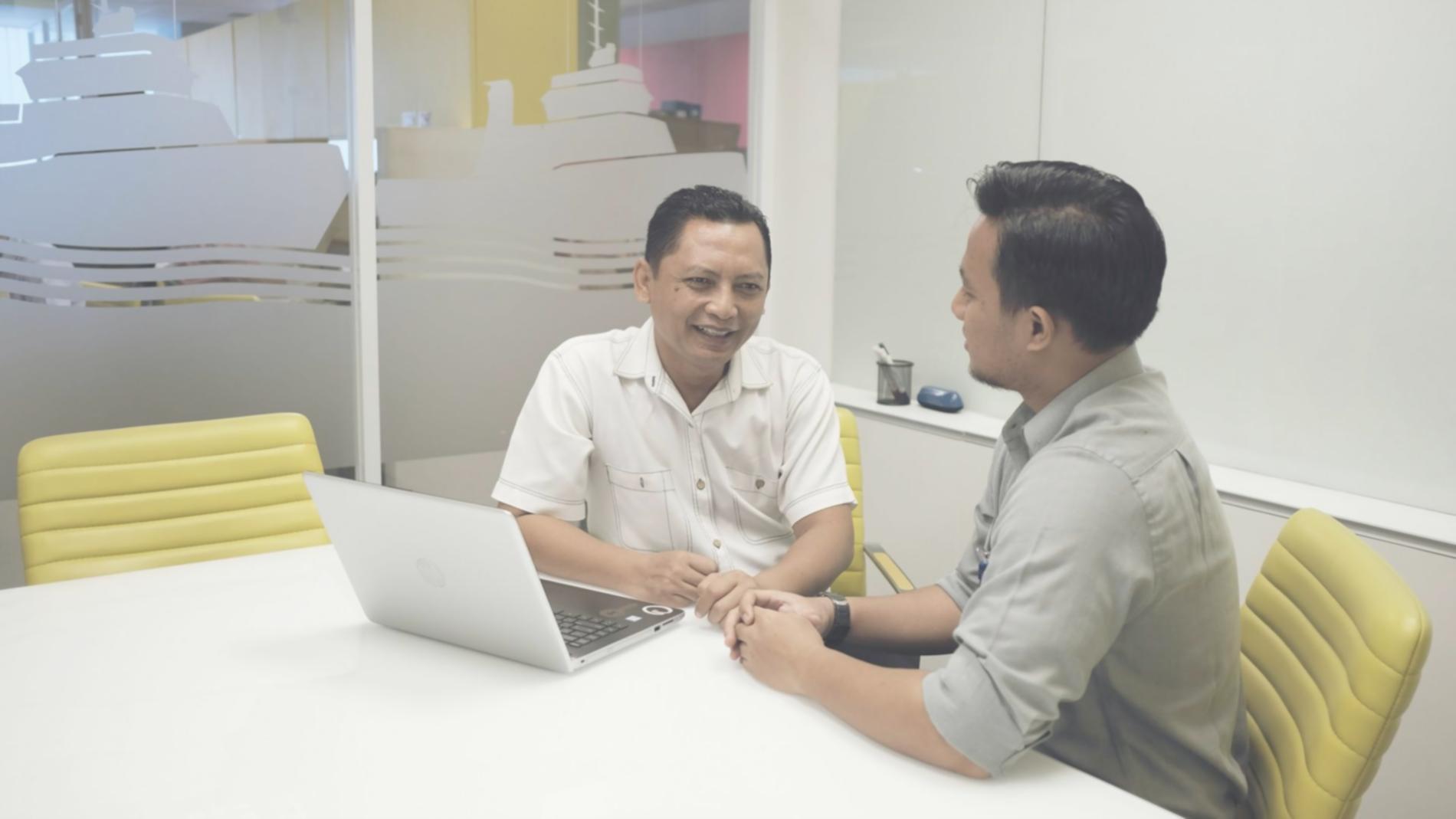 International students reviewing financial documents and planning budget together