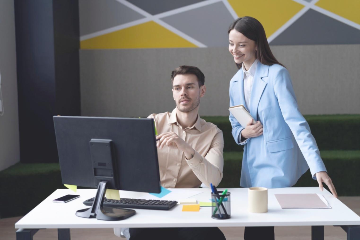 Student working on laptop reviewing financial analysis and budgeting spreadsheets