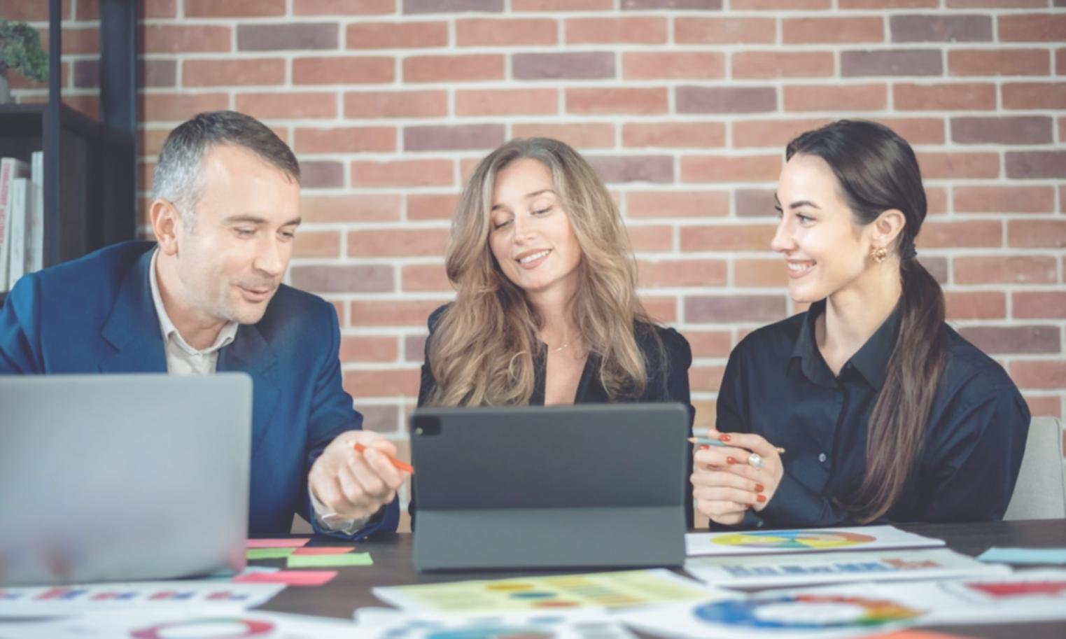 Analyst examining market trends and comparative data